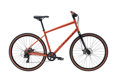 Orange bicycle on a white background