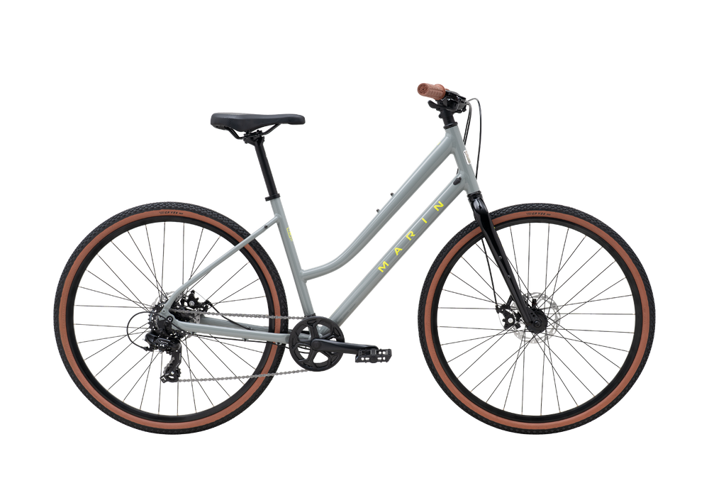 Gray bicycle with brown tires on a white background