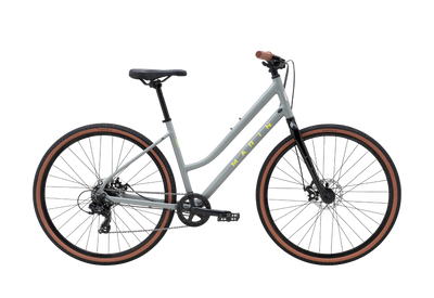 Gray bicycle with brown tires on a white background