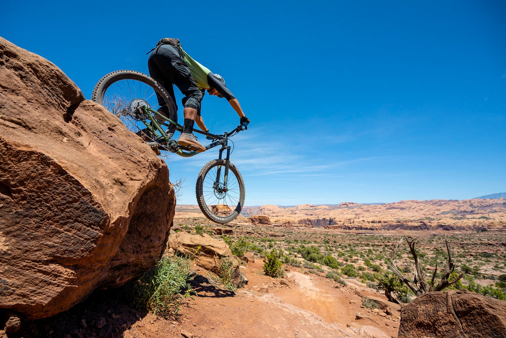 Marin bikes rift zone being ridden off a ledge in moaB
