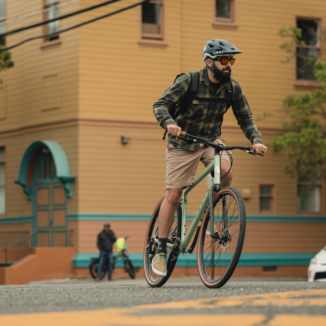 Man riding in an urban location
